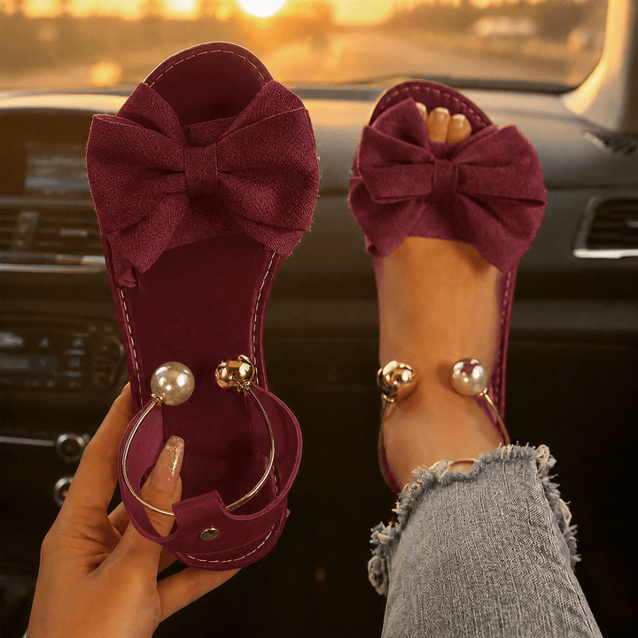 Vennla | Women's Bow Flat Sandals with Pearl Ankle Cuff